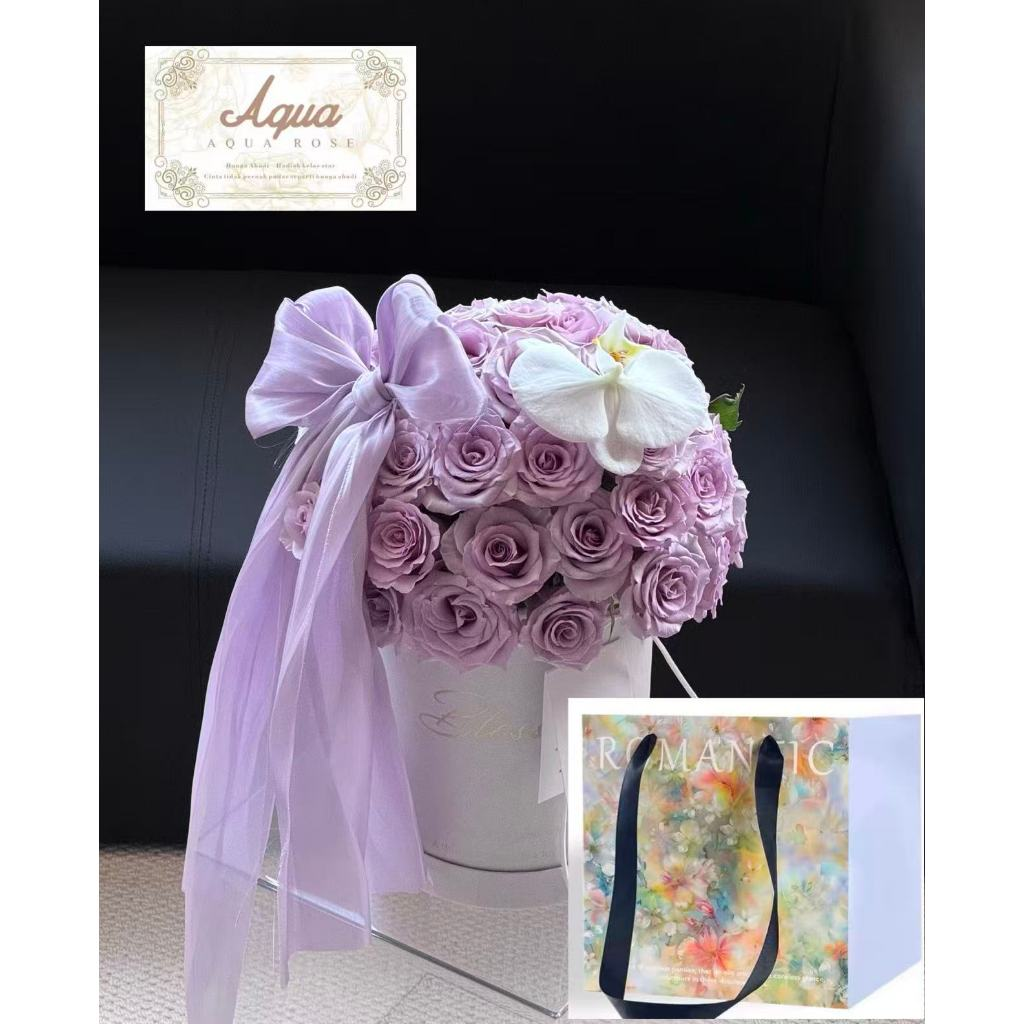 一束拥抱桶形礼品花束，内含紫色玫瑰、香皂花和优质人造花。